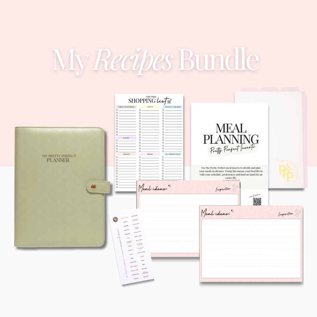 Collection of recipe and planning sheets with a green planner on a pink background